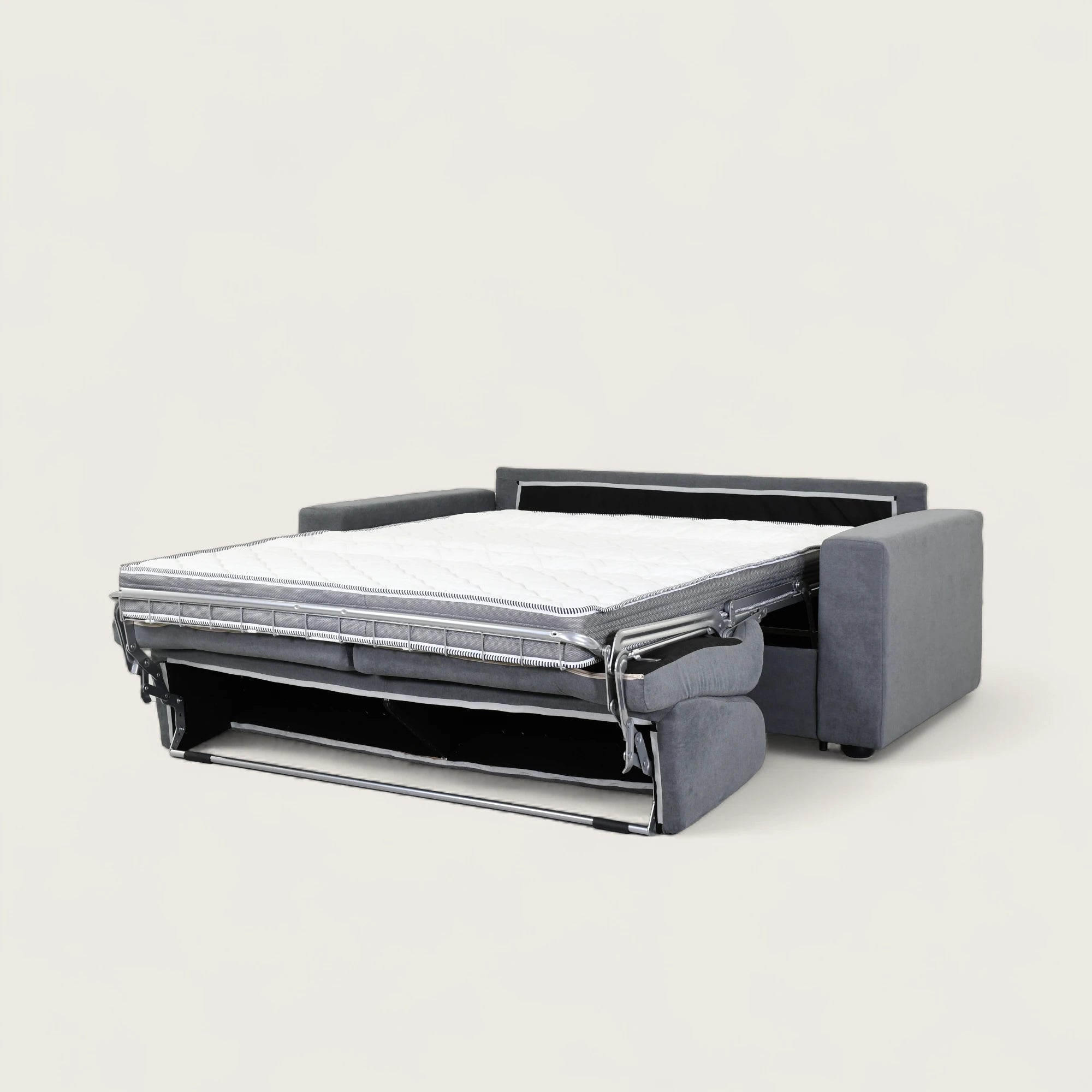 Il divano letto trasformabile in tessuto grigio con materasso e porta cuscini integrato. Design moderno, Braccioli lineari e schienale alto. Area letto 140 x 190 cm