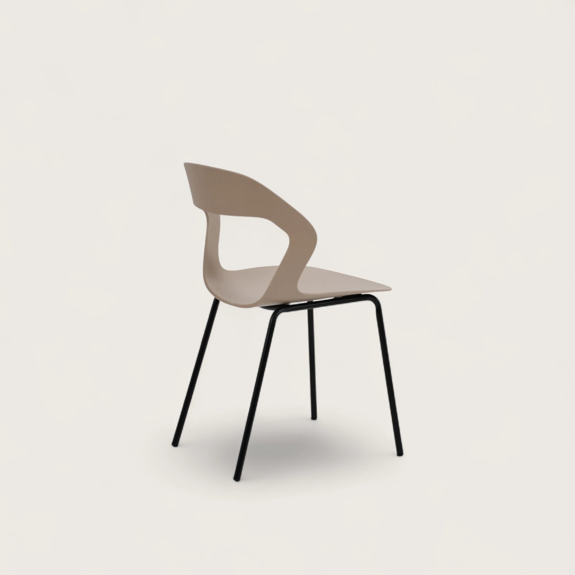 La sedia con seduta e schienale in polipropilene e gambe in metallo nero. Colore tortora, design elegante e materiali resistenti, perfetta per arredare interni con stile e comfort.